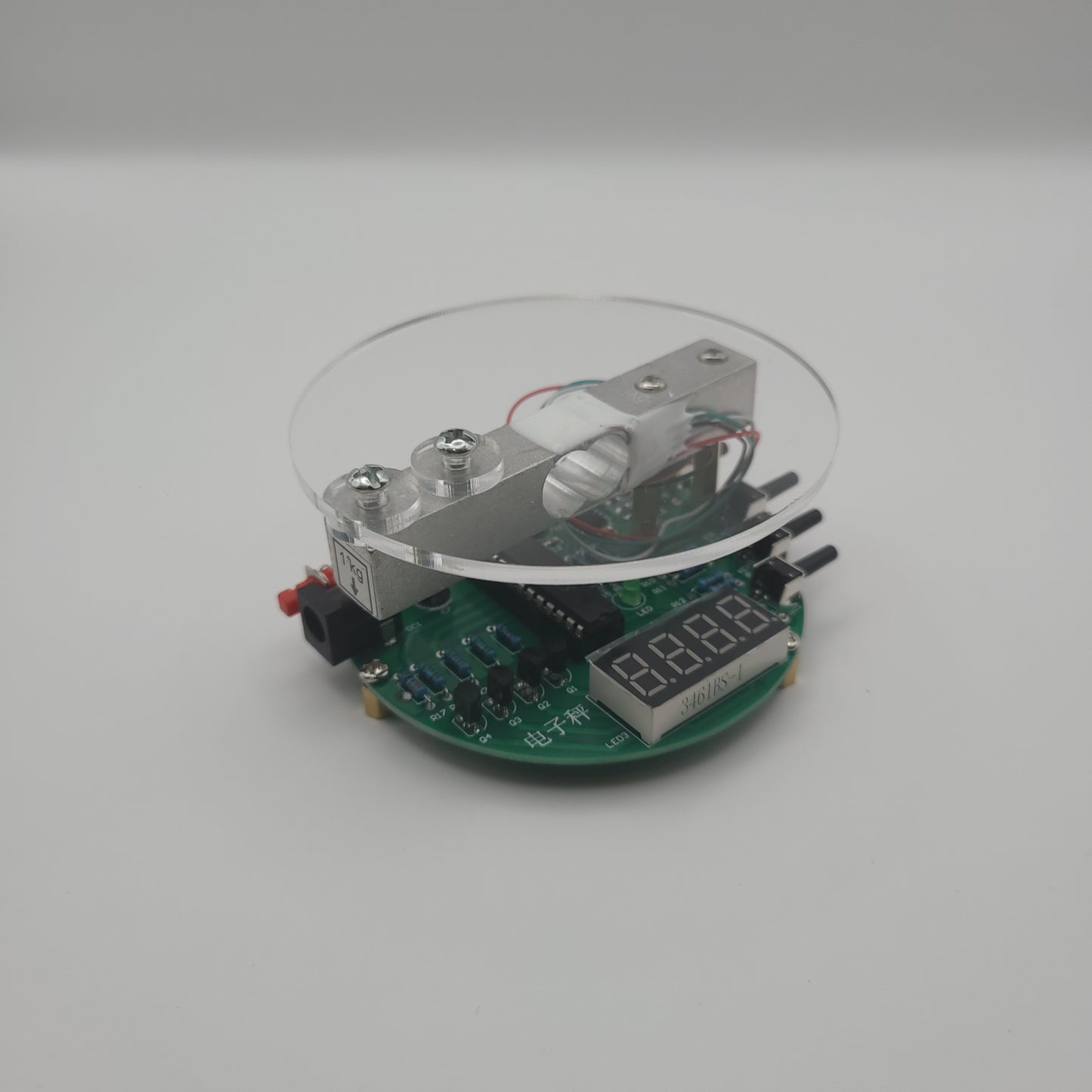 Close-up of an electronic scale on a white background