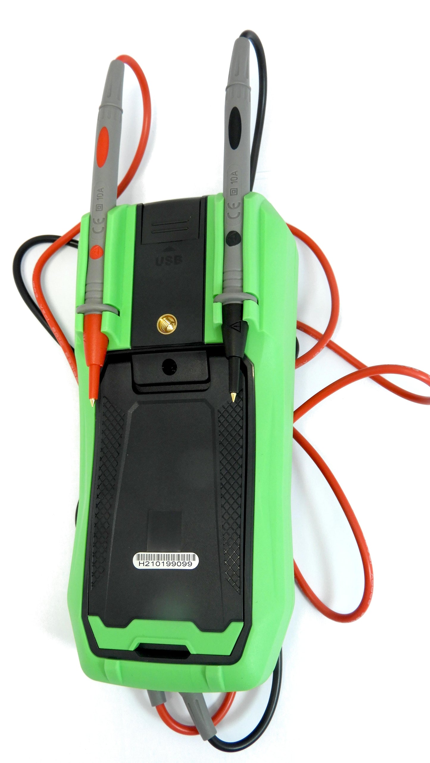 Green battery charger with cables on a white background