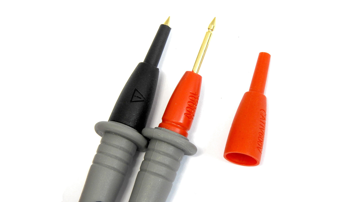Three electrical probes with black, red, and gray handles on a white background