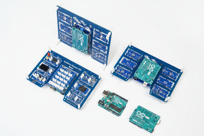 Collection of electronic circuit boards on a light purple background