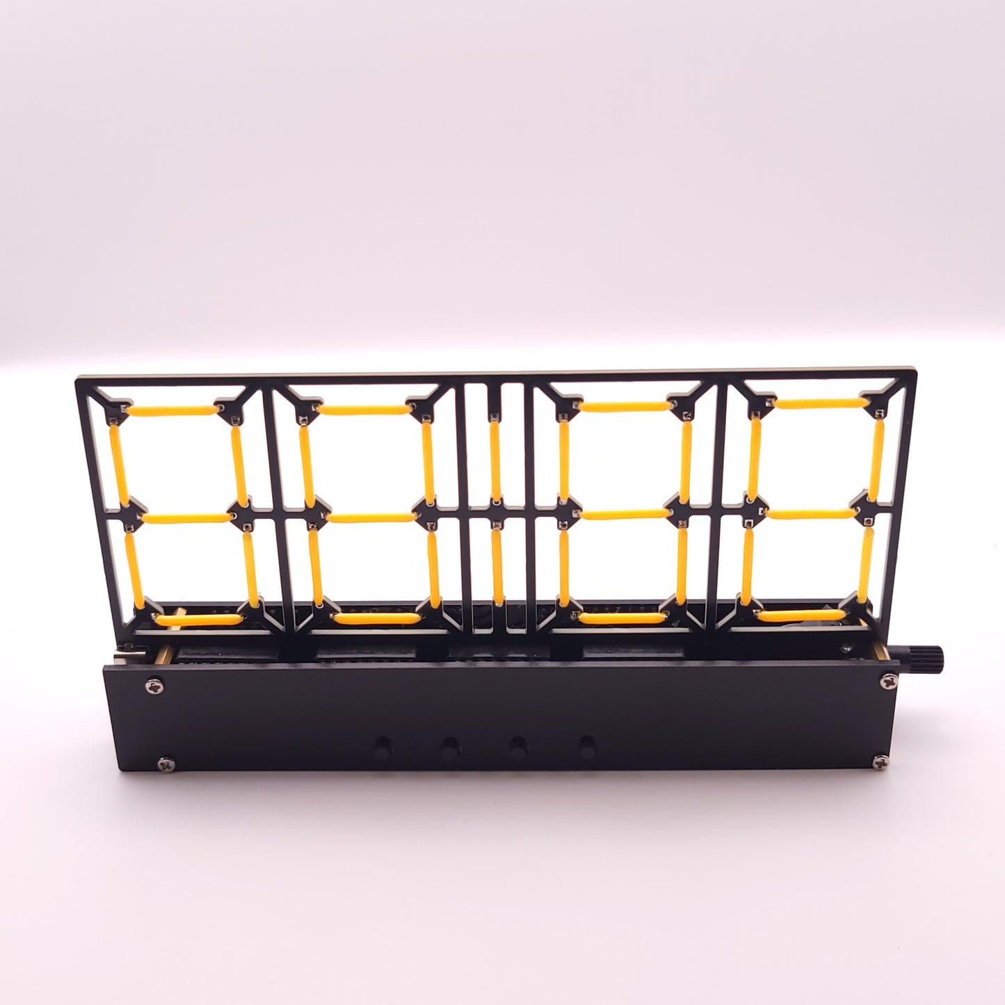 Black and yellow metal grid structure on a white background