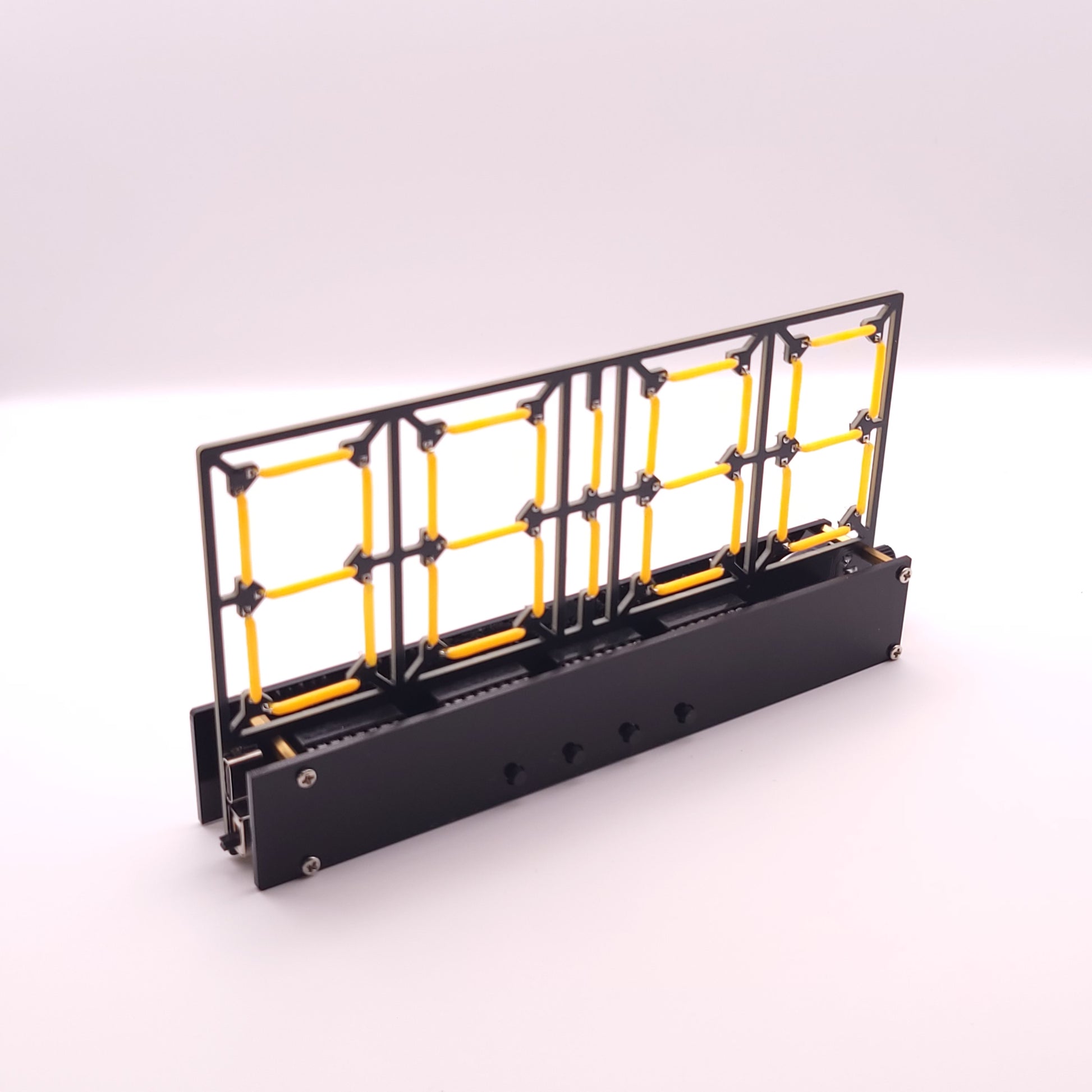 Black and yellow metal grid structure on a white background