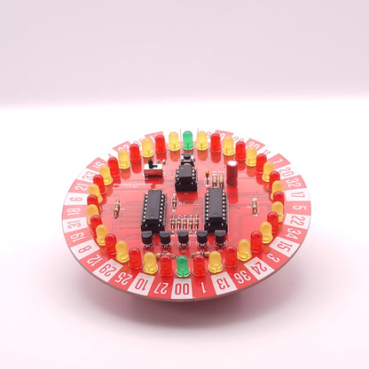 Circular electronic component with LED lights on a white background