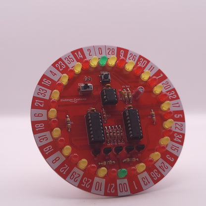 Circular electronic component with red background and various components on a white background