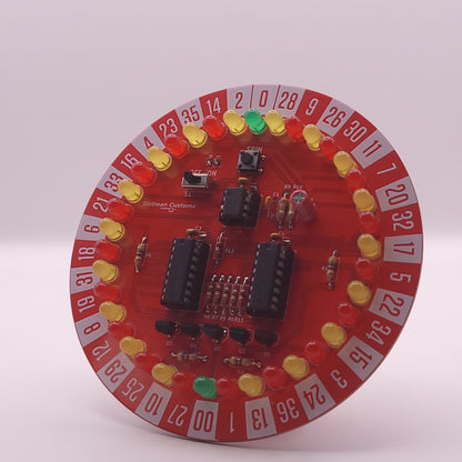 Circular electronic component with red background and various components on a white background